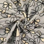 Coupon 123cm French terry brushed bloemenschets lichtgrijs