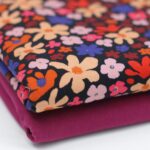 Tricot zwart kobalt retro bloem
