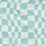 Tricot onregelmatige blokjes ecru/mint