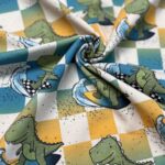 Tricot surfende dino’s – Leff Fabrics