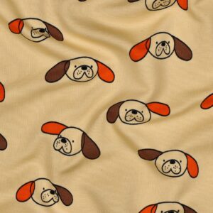 Beige tricot stof met herhalend patroon van schattige hondenkoppen met oranje en bruine oren