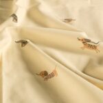 Tricot hondjes beige